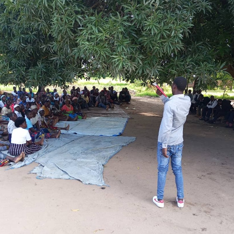 Peer educator engaging with community member on SRHR